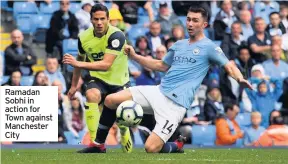  ??  ?? Ramadan Sobhi in action for Town against Manchester City