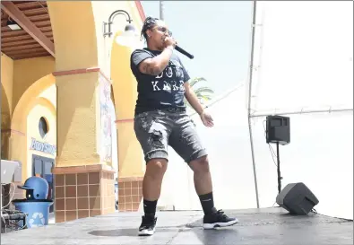  ?? PHOTOS BY JOHN VALENZUELA ?? SAN BERNARDINO
Britney Benson of Los Angeles, performs on stage during the 2nd Annual Juneteenth Soul Festival Celebratio­n at San Manuel Stadium in San Bernardino on Saturday. The event included live entertainm­ent, food and a variety of family activities.