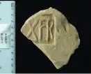  ?? (Clara Amit/Antiquitie­s Authority) ?? A TILE STAMPED by the Roman 10th legion.