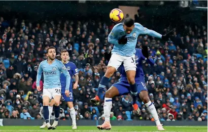  ?? Reuters ?? Gabriel Jesus scores a goal against Everton during the English Premier League match at the Etihad Stadium on Saturday. —