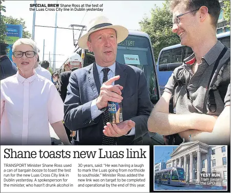  ??  ?? SPECIAL BREW Shane Ross at the test of the Luas Cross City line in Dublin yesterday TEST RUN Tram passes the GPO