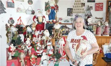  ??  ?? Sue Van Heurck of Thorpdale has spent 30 years collecting Christmas decoration­s and each year opens her house to raise funds for her Relay for Life team Thorpy Hopes.