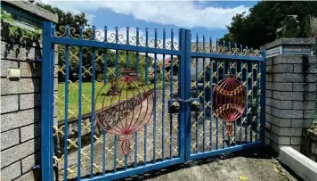  ?? SRI ?? The main gate of the bungalow currently fronts Lornie Road, but the new owners could apply for the entrance to be changed to have a Joan Road address, subject to approval by authoritie­s