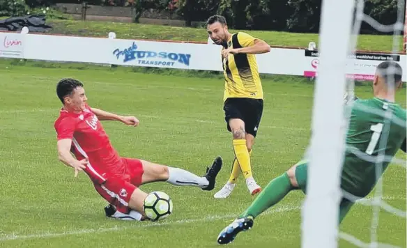  ??  ?? James Fairley, pictured scoring for Hebburn Town, could make his league debut for Sunderland RCA at home to Ryhope on Saturday afternoon.