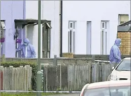  ??  ?? HUNT: The home of Ronald and Penelope Jones, who were honored by the queen in 2010 (right), is searched Saturday, a day after the rail attack