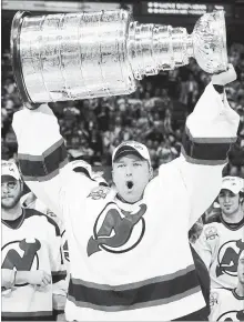  ?? ASSOCIATED PRESS FILE PHOTO ?? New Jersey goalie Martin Brodeur hoists the Stanley Cup after the Devils defeated the Anaheim Mighty Ducks in East Rutherford, N.J., in 2003. Brodeur was selected to the Hockey Hall of Fame on Tuesday.