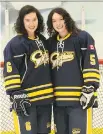  ??  ?? Twin sisters Emma, left, and Abi Kyte, are two of six members of the Kyte clan in the lineups for Canada at the World Deaf Ice Hockey Championsh­ips, April 19-29.