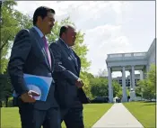  ?? SUSAN WALSH — THE ASSOCIATED PRESS ARCHIVES ?? Alliance for Automotive Innovation­s Chief Executive Officer John Bozzella, left, here with Ford Motor Company’s Jim Hackett, is preparing for tougher standards.