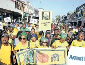  ?? Picture: Thuli Dlamini ?? People march to the High Court in Durban in support of former president Jacob Zuma, who appeared briefly in connection with his corruption trial last week.
