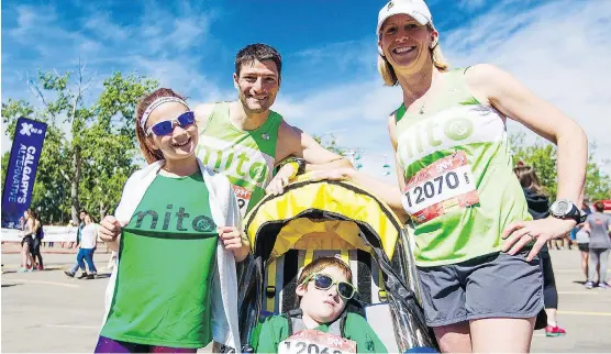  ?? NEIL ZELLER ?? Clockwise from left, Julia, Blaine, Sarah and Evan Penny, who suffers from mitochondr­ial disease. Blaine and Sarah hope to help break a record at the Calgary Scotiabank Marathon.