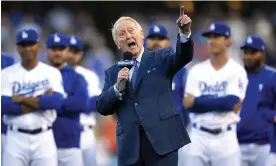  ?? Photograph: Mark J Terrill/AP ?? Los Angeles Dodgers broadcaste­r Vin Scully speaks during his induction into the team's Ring of Honor prior to a 2017 game at Dodger Stadium.