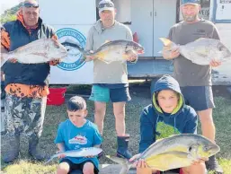  ?? ?? Some of the top 10 fishers with their catches, from rear left: Keith Williams, Gareth McKenzie and Jordon Hyland, front: Arlen Veza and Oscar Parlour.