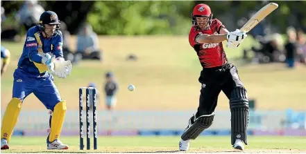  ?? PHOTOSPORT ?? Chad Bowes clubs a ball through the offside during his sparkling innings of 95 from 50 balls for the Kings against the Volts at Hagley Oval yesterday.