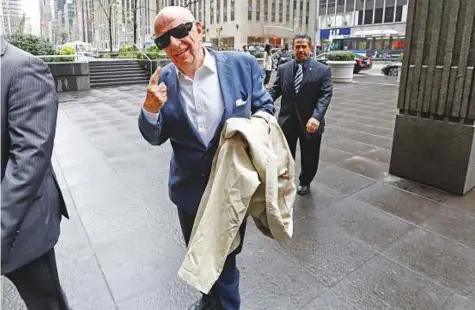  ?? Bloomberg ?? Rupert Murdoch, co-chairman and founder of Twenty-First Century Fox Inc, arrives at the News Corp building in New York. The Murdochs’ power-sharing structure has helped Fox weather a tumultuous period, though its stock hasn’t kept up with its rivals’ gains.