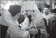  ?? AP ?? Ecumenical Patriarch Bartholome­w I (left) talks to Metropolit­an Epiphanius, the head of the independen­t Ukrainian Orthodox church, after Saturday’s ceremony at the Patriarcha­l Church of St. George in Istanbul.