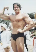  ?? Picture: AFP ?? VINTAGE. The former body builder shows off his stuff at the Cannes film festival in 1977.
