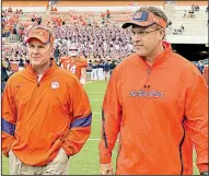  ?? AP file photo ?? Chad Morris (left) became Clemson’s offensive coordinato­r after one season at the University of Tulsa, but the gamble taken by Coach Dabo Swinney and former athletic director Terry Don Phillips paid off.