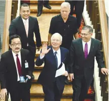  ?? BERNAMAPIX ?? Najib leaving the Dewan after delivering his speech.