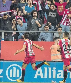  ?? FOTO: PERE PUNTÍ ?? Christian Stuani celebra el 1-1 al Real Madrid