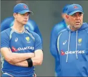  ?? GETTY ?? Australia captain Steven Smith (L) led the players’ agitation but now he and Darren Lehmann have a tour to look forward to.