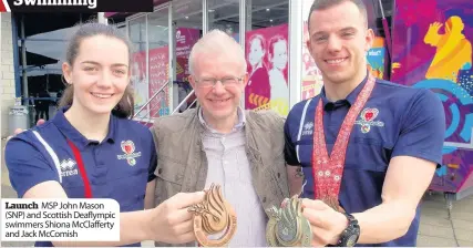  ??  ?? Launch MSP John Mason (SNP) and Scottish Deaflympic swimmers Shiona Mcclaffert­y and Jack Mccomish