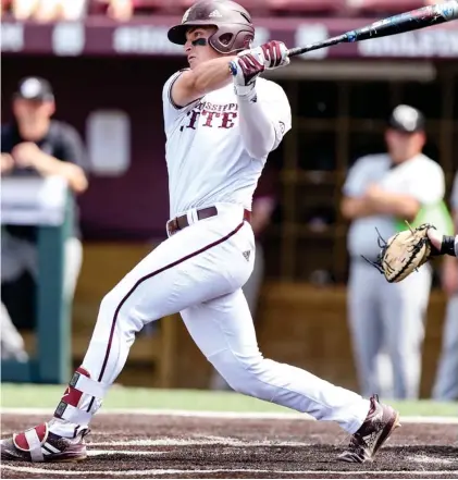  ?? For Starkville Daily News) (Photo by Aaron Cornia, MSU athletics, ?? Justin Foscue swings the bat for Mississipp­i State in Saturday’s game against South Carolina.