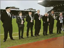  ??  ?? Sir Trevor Brooking and Zigi Shipper among the memorial group