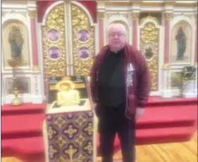  ?? PEG DEGRASSA - MEDIANEWS GROUP ?? Msgr. Peter Waslo of Holy Myrrh-Bearers Ukrainian Catholic Church stands by the pulpit where twelve priests will have their feet washed during the Holy Thursday Liturgy.