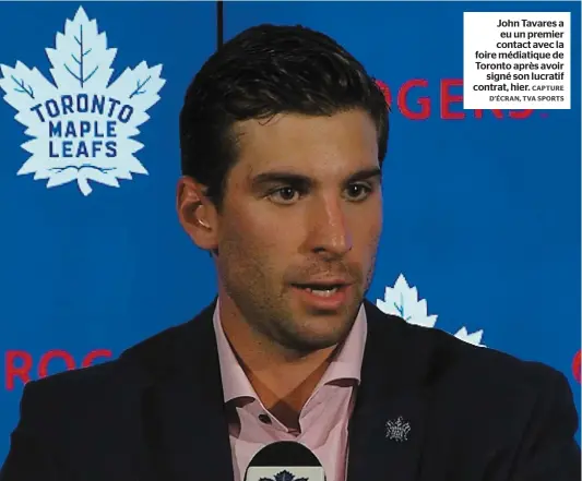  ?? CAPTURE D’ÉCRAN, TVA SPORTS ?? John Tavares a eu un premier contact avec la foire médiatique de Toronto après avoir signé son lucratif contrat, hier.