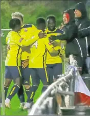  ?? Pictures: Les Biggs ?? Kemo Darboe scores at Whitehawk, left, and celebrates with the fans