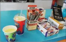  ?? DIGITAL FIRST MEDIA FILE PHOTO ?? High protein snacks such as shakes and bars are on display. Protein is an important nutrient for both before and after workout meals.