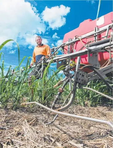  ?? Picture: TERRAIN NRM ?? HELPING REEF: South Johnstone cane farmer Adrian Darveniza bought a more efficient mill mud spreader using funding from the previous pilot Reef Trust Tender program.