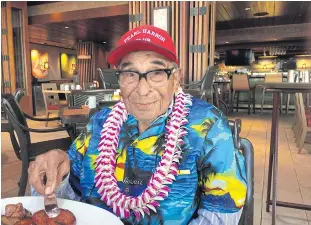  ??  ?? Ray Chavez, a Pearl Harbor survivor from Poway, California, poses for a photo as he was eating breakfast in Honolulu in 2016.