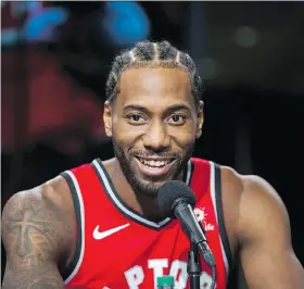  ?? ERNEST DOROSZUK ?? Kawhi Leonard speaks during Raptors Media Day in Toronto on Monday. He kept his thoughts on his past in San Antonio and pending free agency close to his vest, noting his focus is on this season.