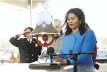  ?? Scott Strazzante / The Chronicle ?? S.F. Mayor London Breed rings a bell at 5:04 p.m., the time when the Loma Prieta earthquake struck on Oct. 17, 1989.