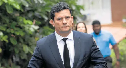  ?? SILVIA IZQUIERDO–1/11/2018 ?? Ministro. O juiz Sérgio Moro após se encontrar com o presidente eleito, Jair Bolsonaro, no Rio; convite foi feito na quinta