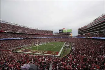  ?? T AP PHOTO/JEFF CHIU ?? In this Jan. 19, file photo, fans at Levi’s Stadium watch as the Green Bay Packers kickoff to the San Francisco 49ers during the first half of the NFL NFC Championsh­ip football game in Santa Clara, Calif. The San Francisco 49ers will play their season opener without fans in attendance because of the COVID-19 pandemic. The team said Tuesday after consulting with local officials that the Sept. 13 game against Arizona at Levi’s Stadium will be played without spectators.