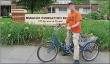  ?? CONTRIBUTE­D BY LAURA BERRIOS ?? Roger Schuppert, 71, rides his adult tricycle all over Decatur, using the city’s dedicated bike lanes and pathways. Schuppert, who doesn’t own a car, previously had to walk or ride MARTA everywhere he went. The bike saves time and energy, he said.