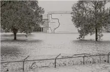  ?? Godofredo A. Vasquez / Houston Chronicle ?? Crosby’s Arkema plant, which has been shut down since Friday, houses a class of chemical that can explode or catch fire if it is not kept at a low enough temperatur­e.