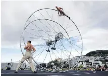  ?? Photo: FAIRFAX NZ ?? Acrobats Arcane perform in Wellington’s Waitangi Park to launch the 2012 arts festival.