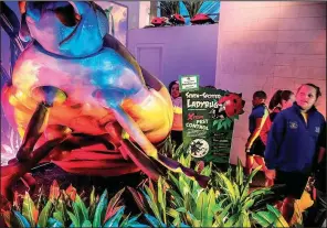  ?? Arkansas Democrat-Gazette/JOHN SYKES JR. ?? A gigantic ladybug greets visitors from North Little Rock’s Crestwood Elementary to “Xtreme Bugs” at the Clinton Presidenti­al Center. Each bug is accompanie­d by a colorful informatio­n panel that explains why the bugs are “extreme.”