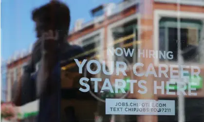  ?? ?? A Chipotle restaurant in Cambridge, Massachuse­tts, advertises it is hiring. Photograph: Brian Snyder/Reuters