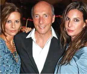  ??  ?? Fashion tycoon: Peter Simon with daughters Jessica, left, and Zara