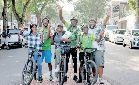  ?? ?? GETTING ready for an Open Streets project in Florida Road are, from left, Tumi Malafane, Siyabonga Njiva, Hillary Mfune (a barista from Humble Coffee), Brightson Dladla, Konke Ngcobo and Meshack Newman, one of the organisers of the event. The cyclists are all from the Go! Durban Cycle Academy. l SHELLEY KJONSTAD African News Agency (ANA)