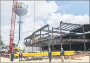  ?? SUBMITTED PHOTO ?? Pictured from left: Immediatel­y prior to the hoisting of the last steel beam needed to frame WCU’s largest and newest building, The Sciences & Engineerin­g Center and The Commons: WCU Alumni Associatio­n President Bill Scottoline ’74; Founder, President, and CEO of ProMetrics Mark Duey; West Chester University President Chris Fiorentino; Student Services, Incorporat­ed Chair of the Board of Directors Bernie Carrozza ’66.