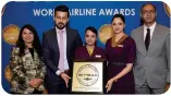  ?? ?? FLYING HIGH: Vistara’s Vinod Kannan (right) and Rashmi Soni, VP and head, corporate communicat­ions (left) with other members of the team