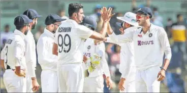  ?? PTI ?? Team India celebrate during the 4th day of the second cricket Test match with England at MA Chidambara­m Stadium in Chennai on Tuesday. India won the match by 137 runs to level the four-match series 1-1 on Tuesday.