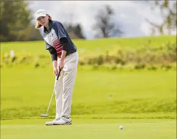  ?? Paul Buckowski / Times Union ?? Brayden Dock of Glens Falls hits a putt on the first hole during the final round of the boys’ Section II state qualifier at the Fairways of Halfmoon. He was undefeated in Foothills Council play and also won the sectional and league tournament­s.