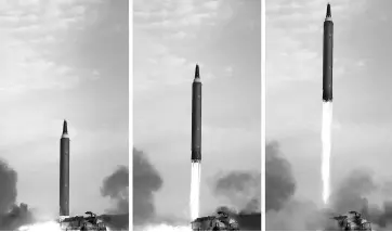  ?? KCNA VIA REUTERS ?? An undated picture of the Hwasong-12 missile launch, which was guided by North Korean leader Kim Jong Un