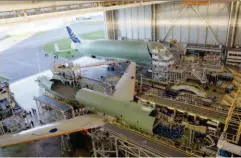  ??  ?? Seen outside its assembly hangar in Toulouse, France, the No. 1 Airbus Belugaxl – the first in a fleet of five – is one of the most voluminous aircraft in existence, able to transport both wings of the A350 XWB jetliner at once.